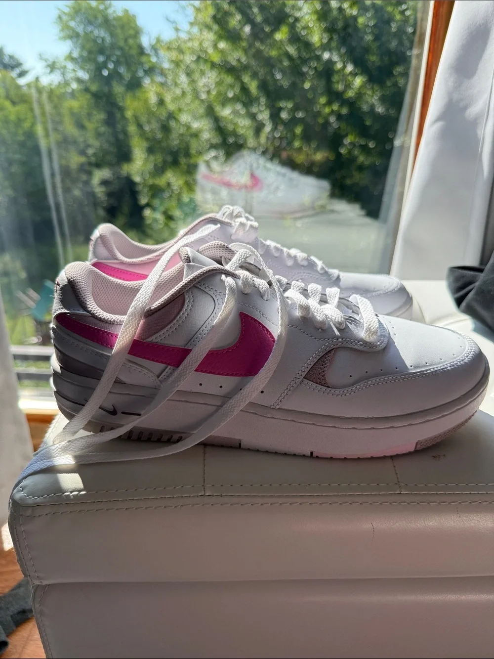 Nike Women's White Sneakers with Pink Swoosh